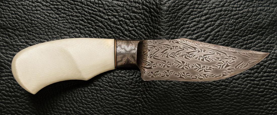 couteau rare lame damas petit hunter