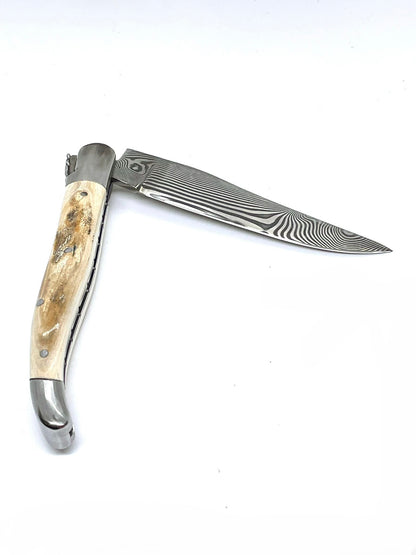 Couteau pliant damas artisanal modèle Laguiole en défense de mammouth