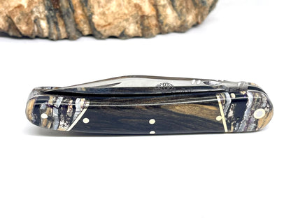 Coutellerie Passarelli - Couteau Alsacien lame pliable 10 cm mitres en molaire de mammouth, Ébène royale du Laos
