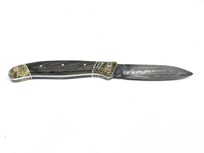 Coutellerie Passarelli - Couteau de chasse lame de Damas 10 cm fixe non pliable ébène royale du Laos et molaire de mammouth stabilisée et teintée