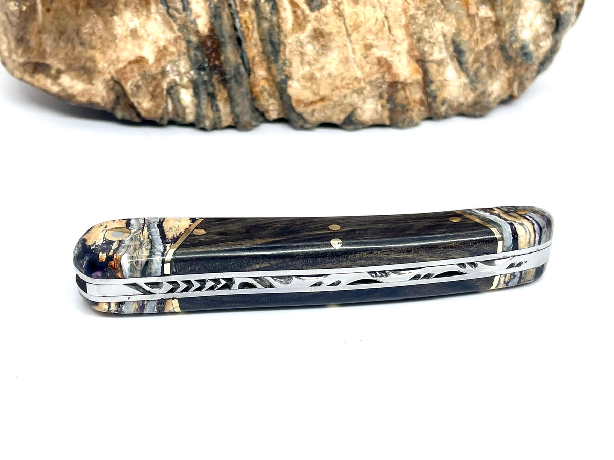 Coutellerie Passarelli - Couteau Alsacien lame pliable 10 cm mitres en molaire de mammouth, Ébène royale du Laos
