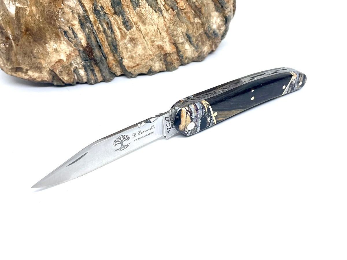 Coutellerie Passarelli - Couteau Alsacien lame pliable 10 cm mitres en molaire de mammouth, Ébène royale du Laos